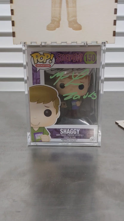 Placing Funko Pop inside Uncle Zac's Private Security box